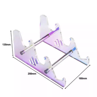 Qube mechanical keyboard display stand with three layers of transparent acrylic.