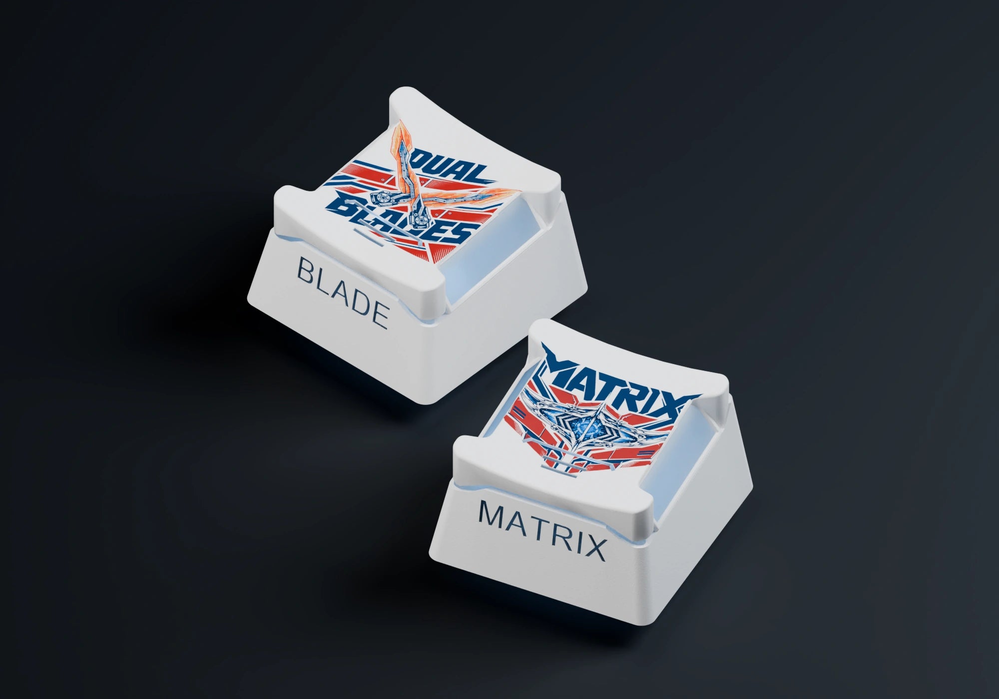 Two three-dimensional keycaps with the Matrix of Leadership and crossed energon blade designs